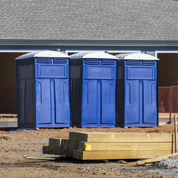what is the cost difference between standard and deluxe portable restroom rentals in Stow Creek